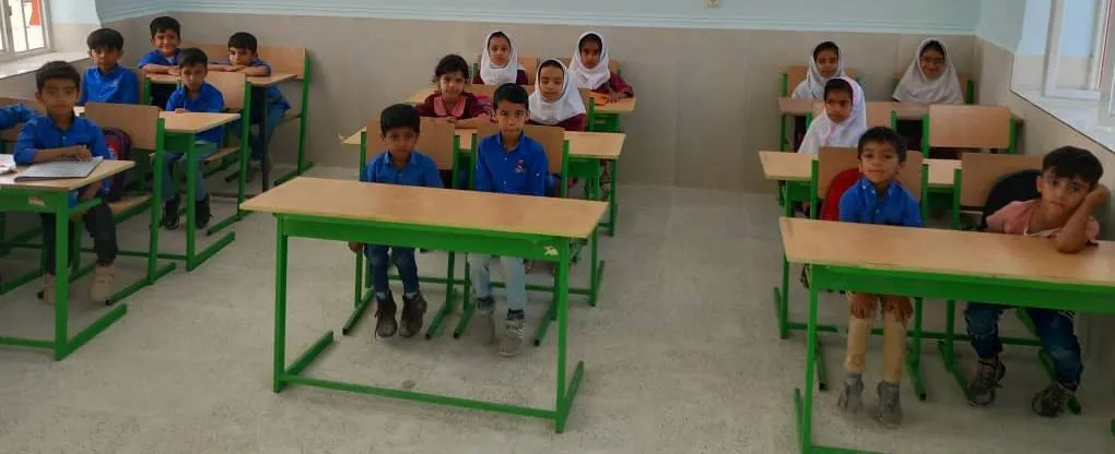 Primary school kids in a new classroom